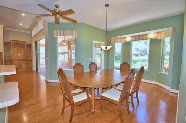 a bathroom with a shower a sink and a mirror