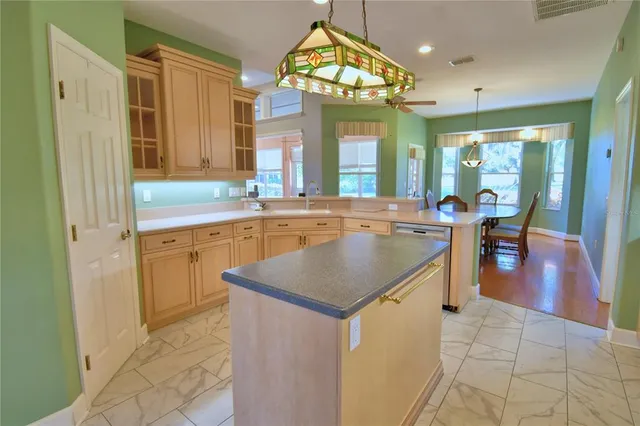 a large bathroom with a double vanity sink mirror and shower