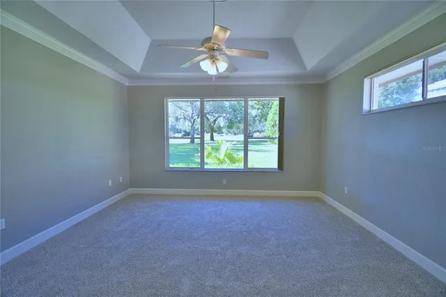 a view of a chairs and table in a room