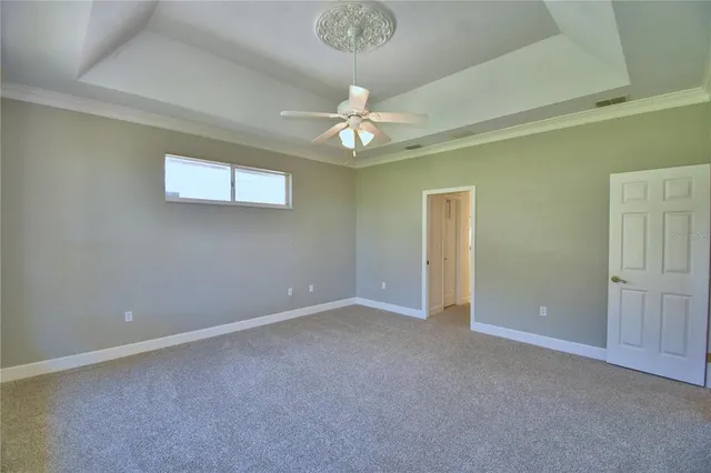 a view of a house with a yard and garage