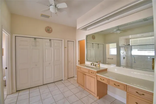 a front view of a house with garden and porch