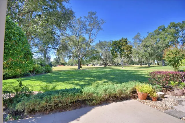 a view of outdoor space with deck and garden