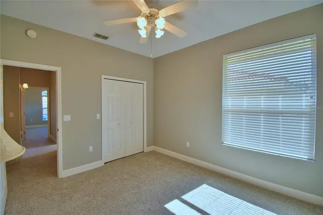 a view of a house with garden and plants