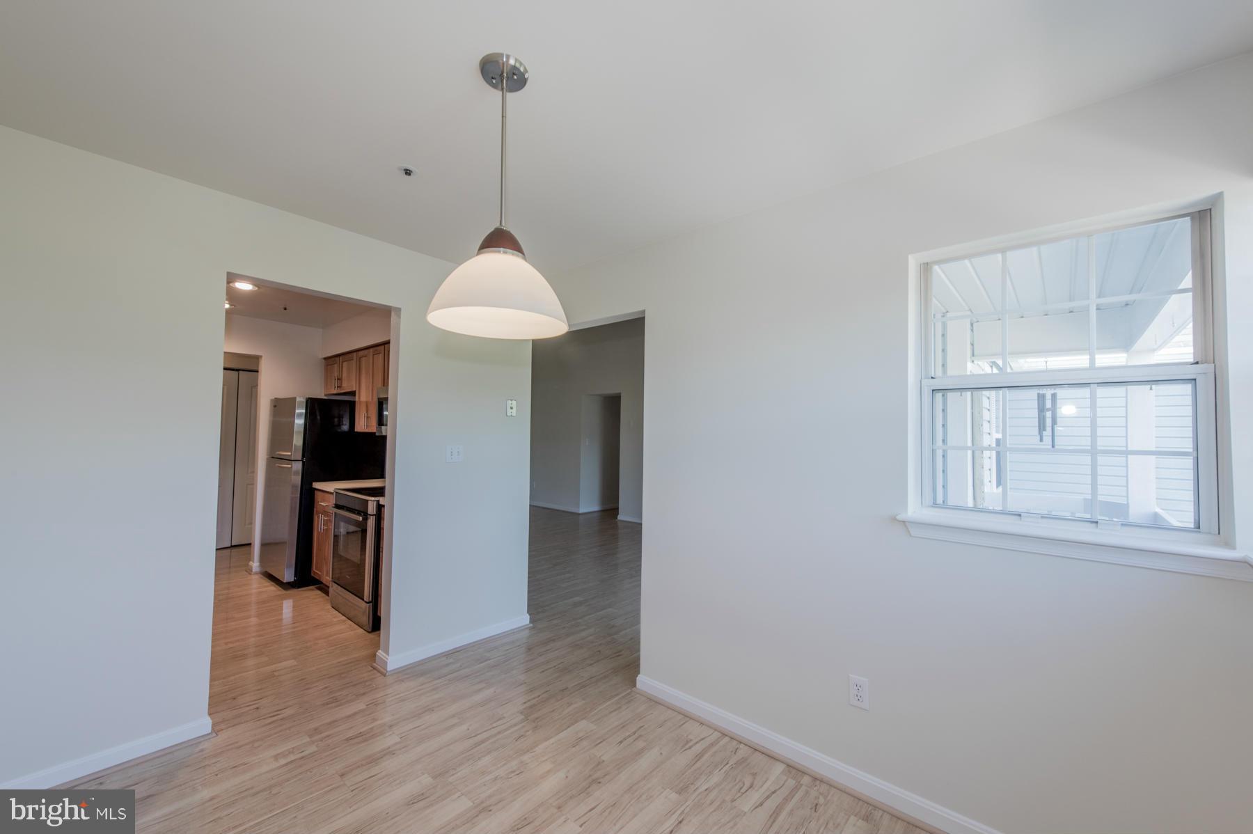 8355 Montgomery Run Road, Unit I Ellicott City, MD 21043 - Photo 7 of 19 Dining Room