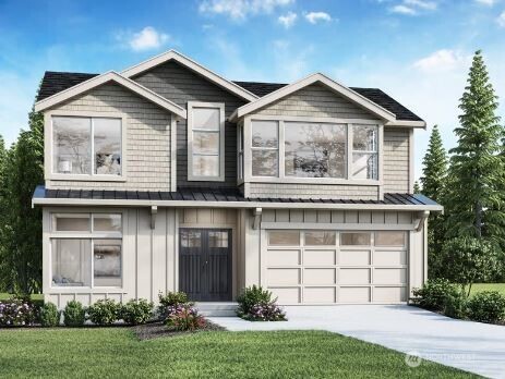 1116 North 34th Street Renton, WA 98056 - Photo 1 of 1 a front view of a house with a yard and garage