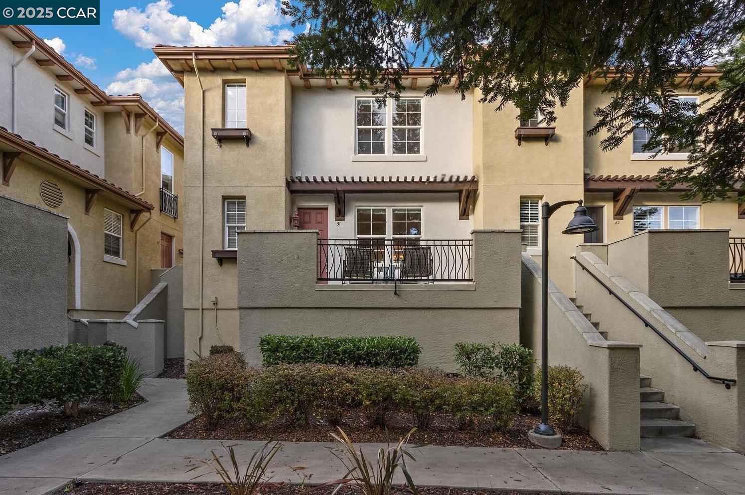 31 Picasso Court Pleasant Hill, CA 94523 - Photo 1 of 36 a front view of a house with plants