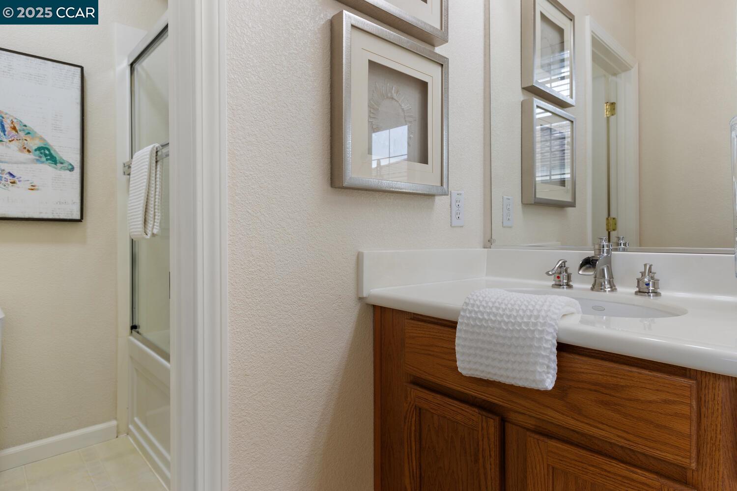 31 Picasso Court Pleasant Hill, CA 94523 - Photo 19 of 36 a bathroom with a sink and a mirror