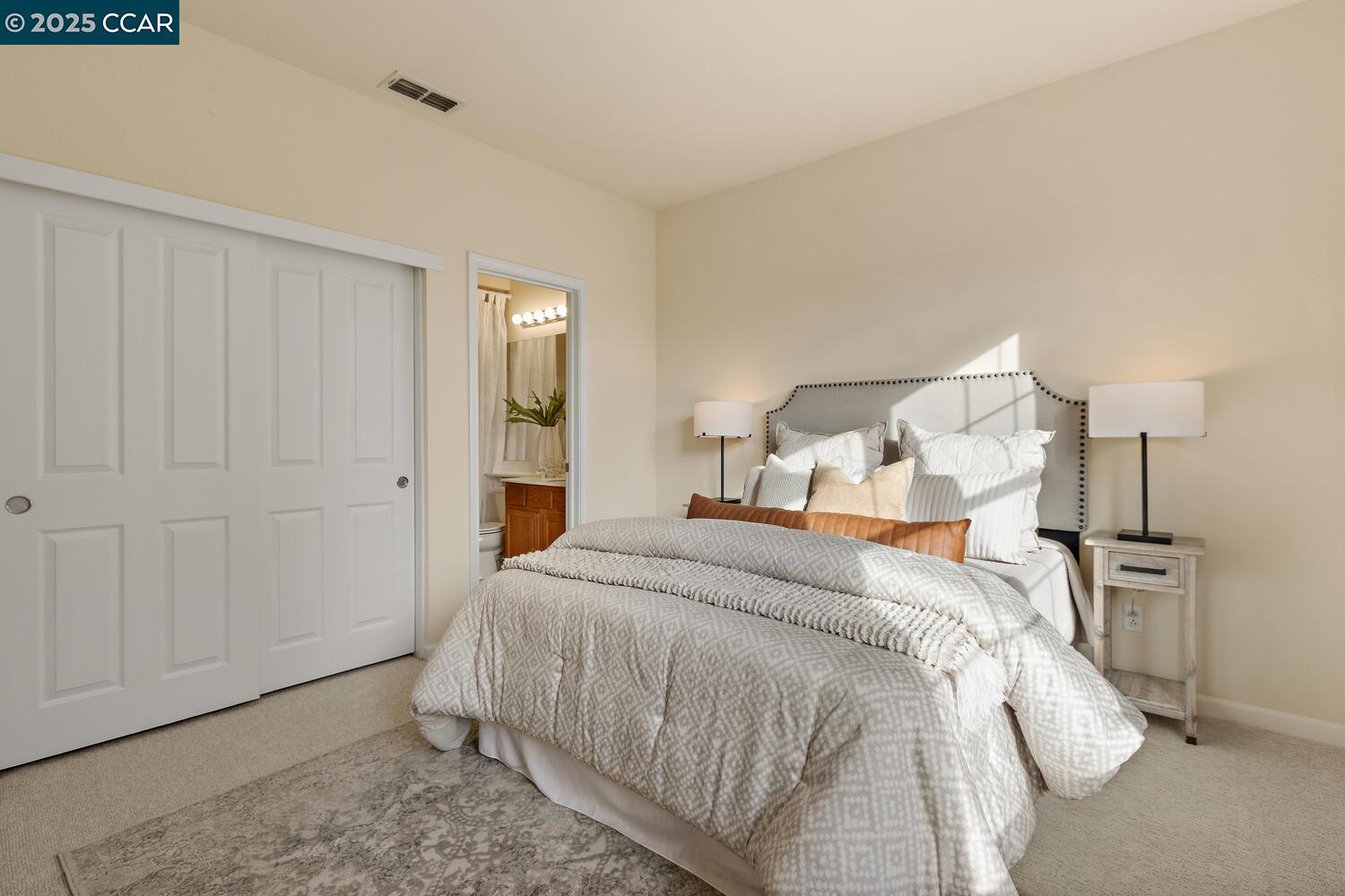 31 Picasso Court Pleasant Hill, CA 94523 - Photo 24 of 36 a bedroom with a bed and a mirror