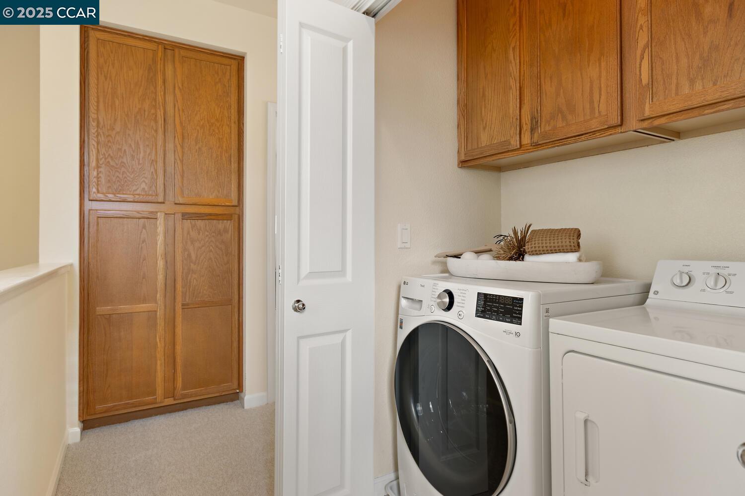 31 Picasso Court Pleasant Hill, CA 94523 - Photo 27 of 36 a utility room with dryer and washer