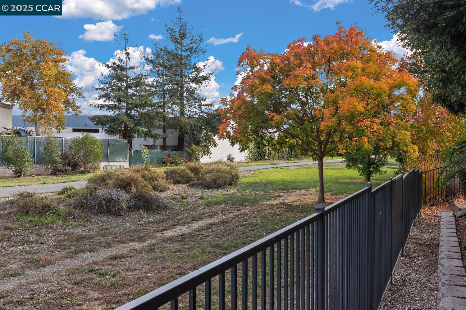 31 Picasso Court Pleasant Hill, CA 94523 - Photo 30 of 36 a view of a wooden fence and a pathway