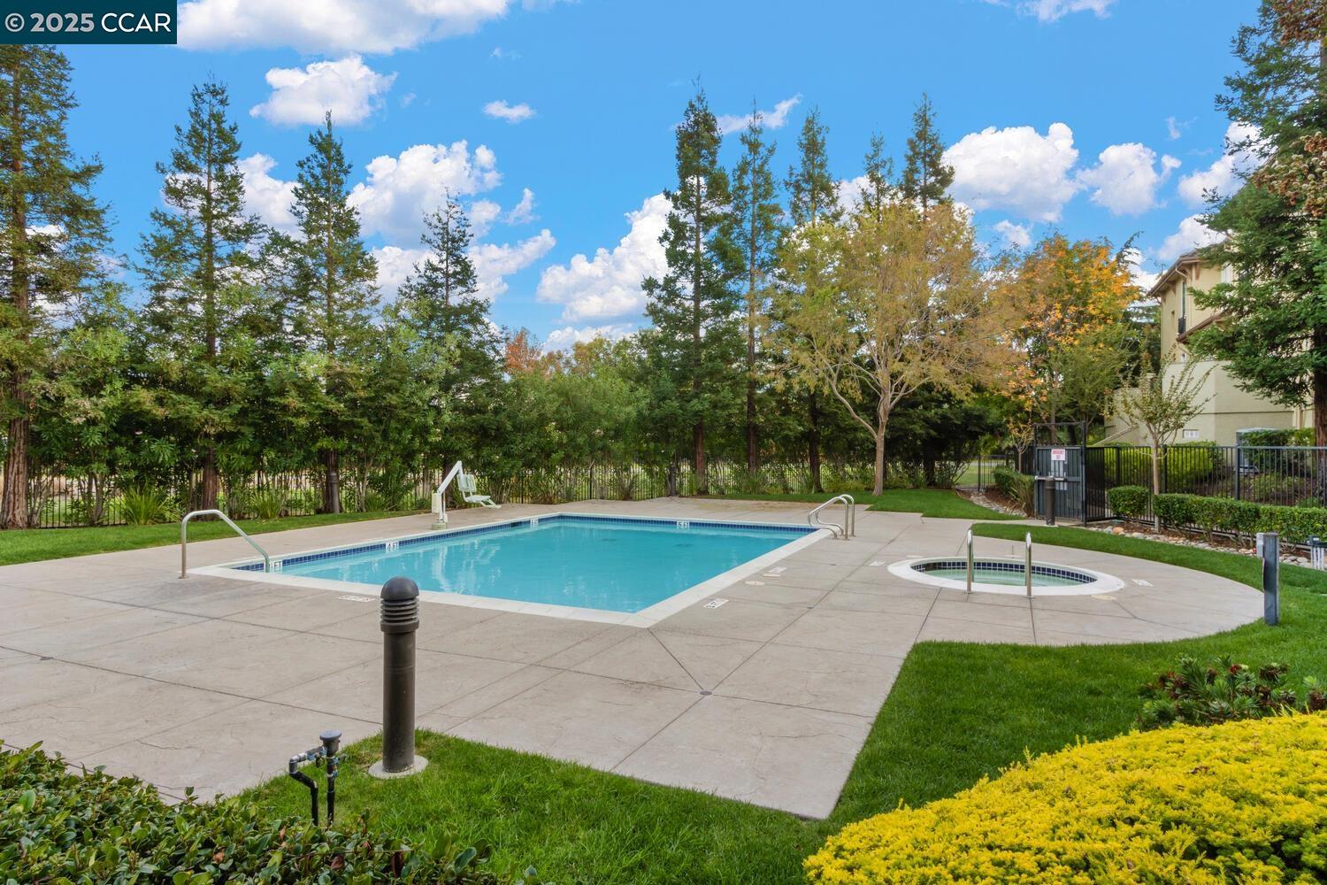 31 Picasso Court Pleasant Hill, CA 94523 - Photo 34 of 36 a view of a swimming pool with a patio