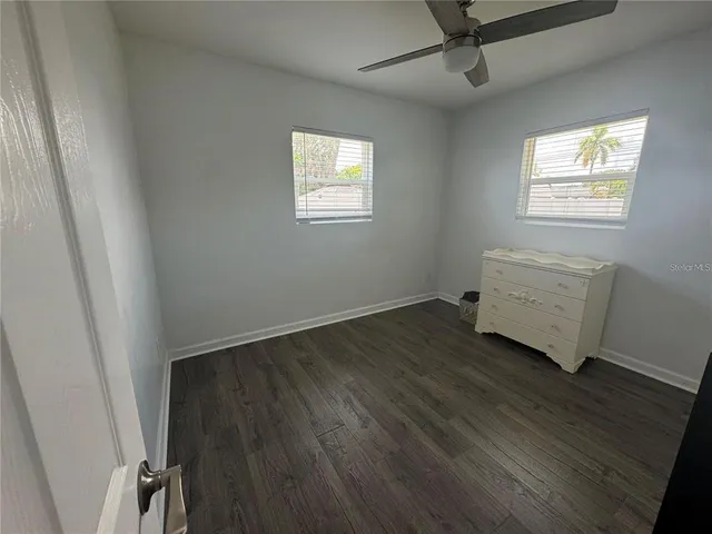 a room with furniture and a window