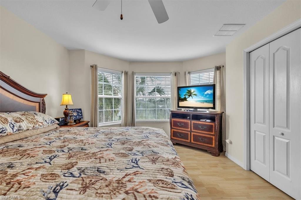 12914 Stone Tower Loop Fort Myers, FL 33913 - Photo 28 of 50 a bedroom with a bed and furniture