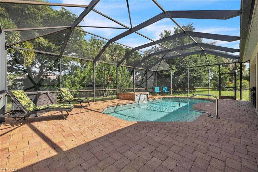 12914 Stone Tower Loop Fort Myers, FL 33913 - Photo 36 of 50 a view of a swimming pool with a patio