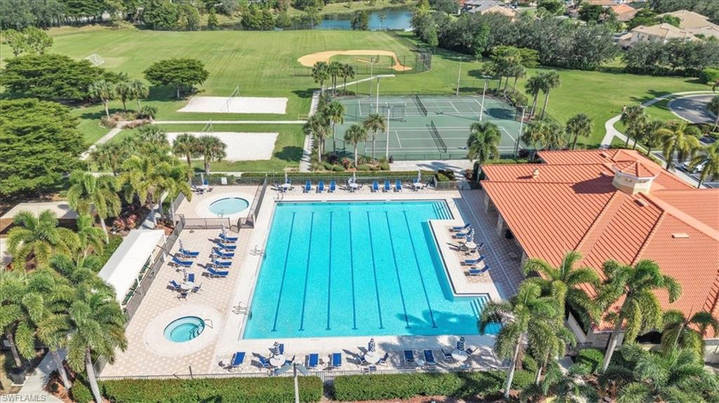 12914 Stone Tower Loop Fort Myers, FL 33913 - Photo 44 of 50 an aerial view of a house with a garden and lake view