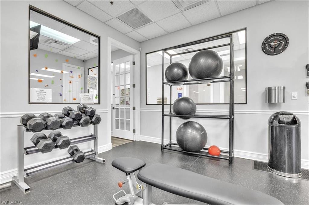 12914 Stone Tower Loop Fort Myers, FL 33913 - Photo 47 of 50 a living room with furniture and a wooden floor