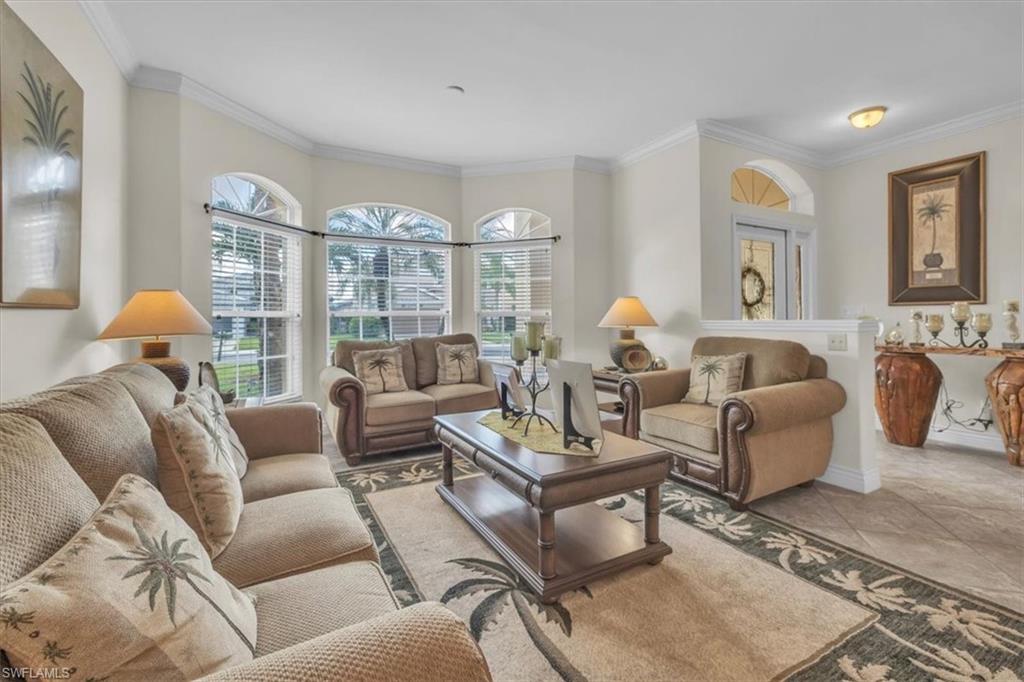 12914 Stone Tower Loop Fort Myers, FL 33913 - Photo 6 of 50 a living room with furniture and a large window