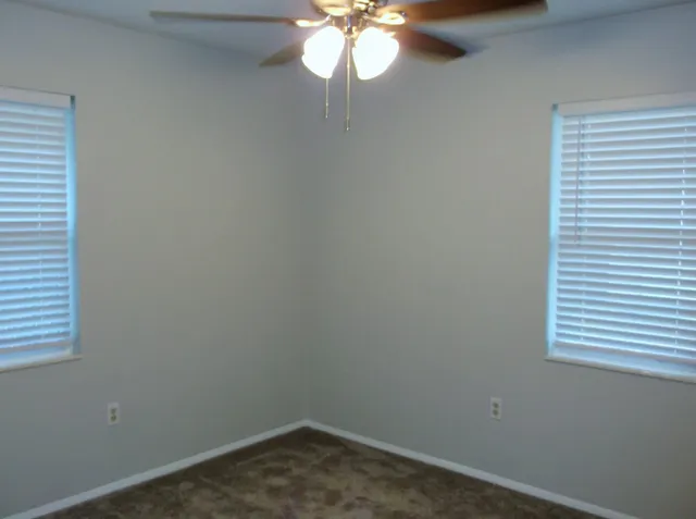 a bathroom with a toilet a sink and shower