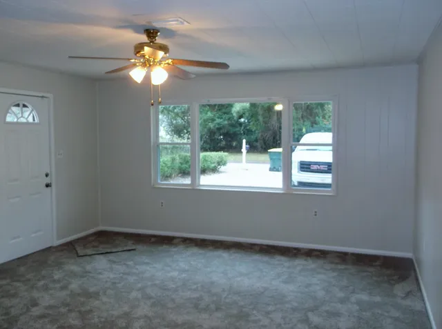 a kitchen with stainless steel appliances granite countertop a sink and a stove