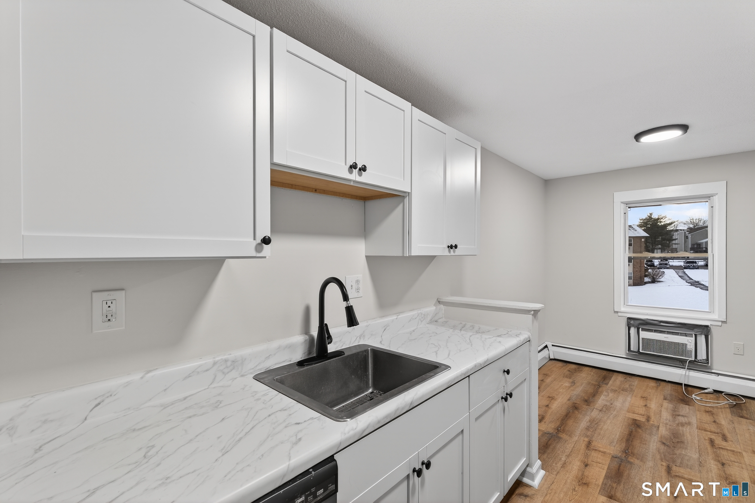 45 Jefferson Road, Unit 37 Branford, CT 06405 - Photo 13 of 24 a kitchen with a sink and cabinets