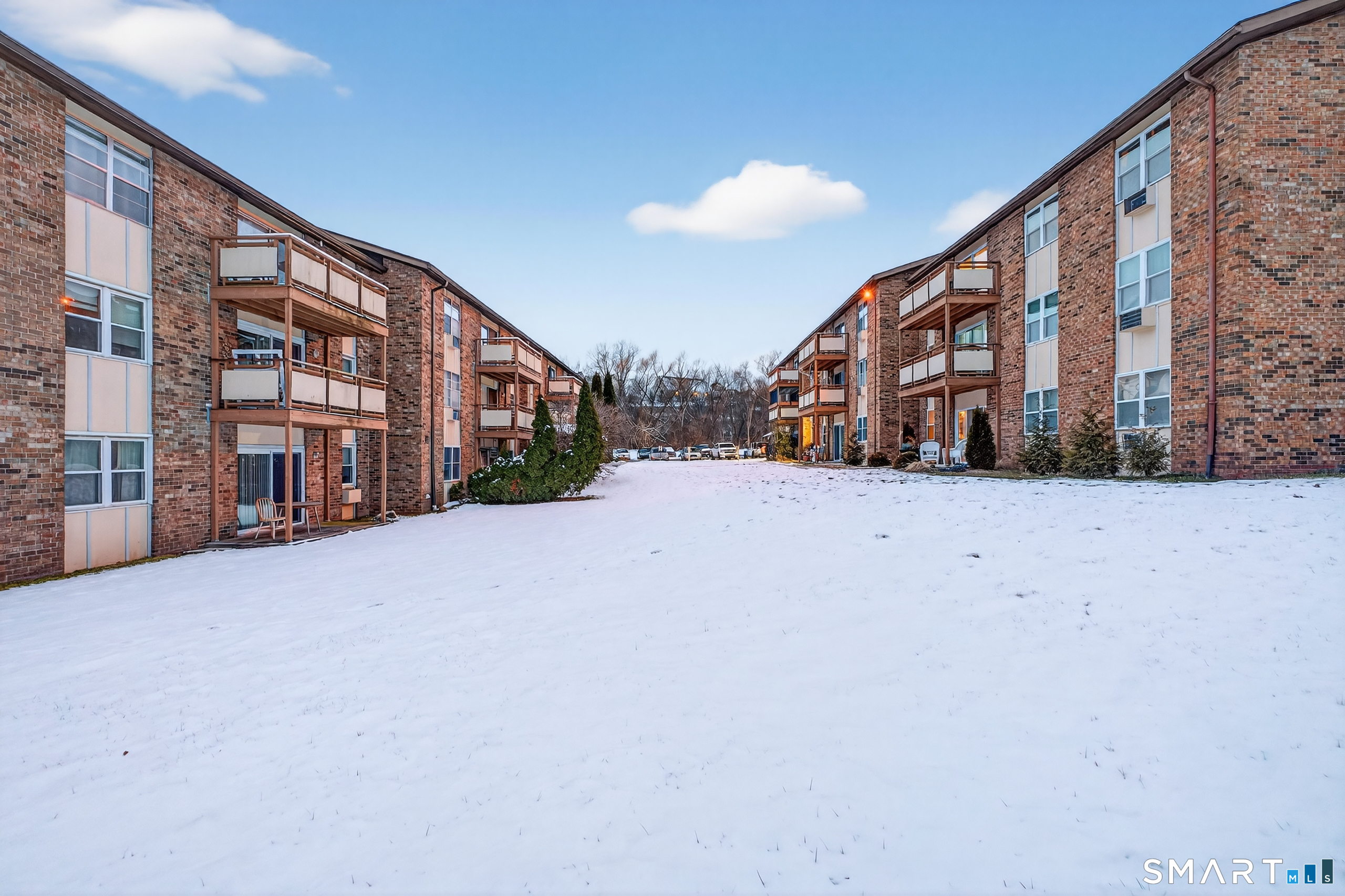 45 Jefferson Road, Unit 37 Branford, CT 06405 - Photo 4 of 24 a view of a building with a street