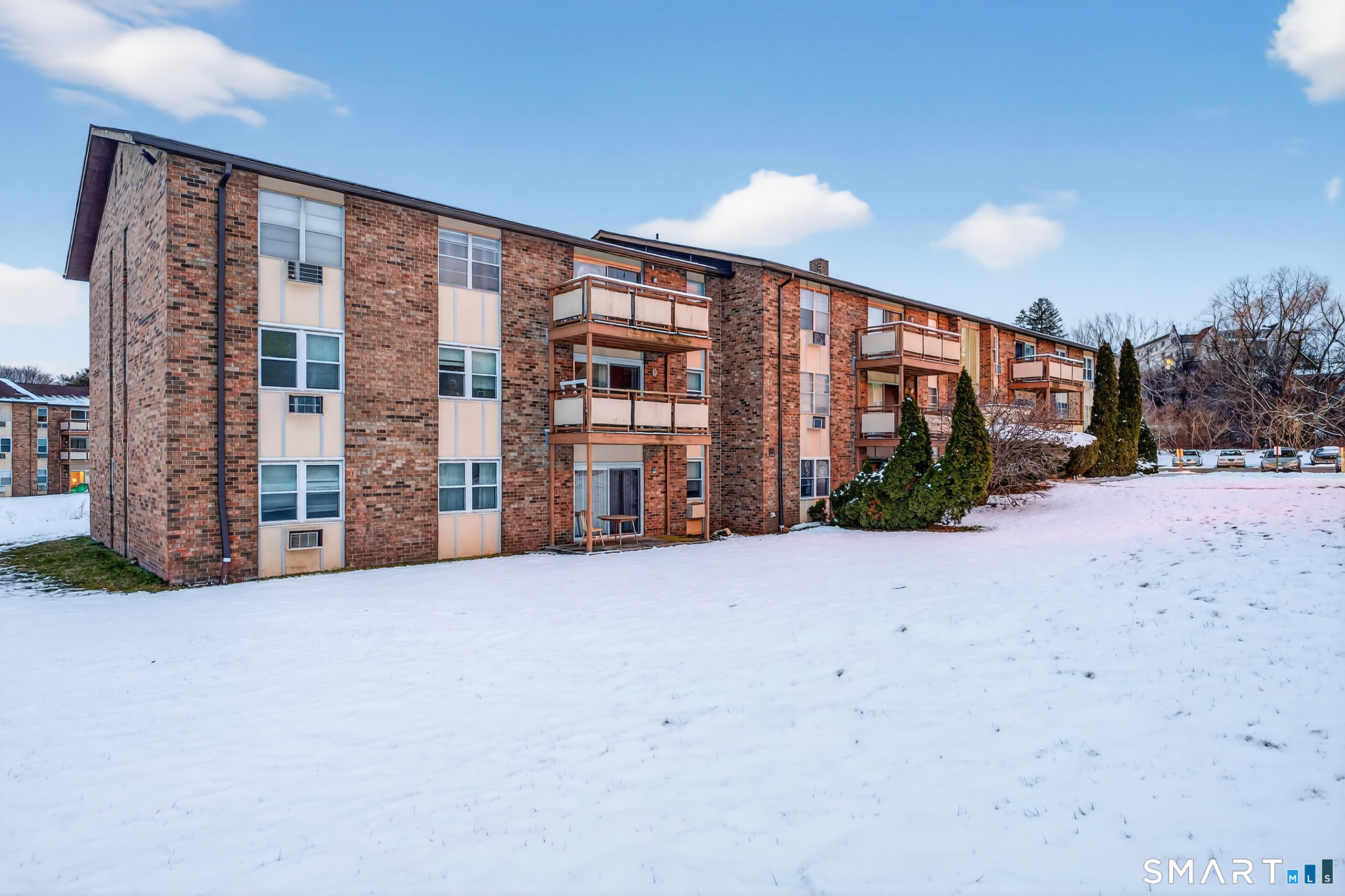 45 Jefferson Road, Unit 37 Branford, CT 06405 - Photo 5 of 24 a view of an apartment with a floor to ceiling window and yard