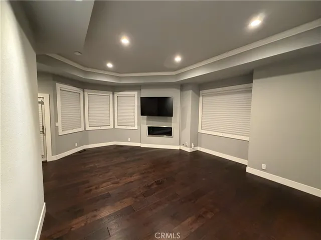 a large bathroom with a double vanity sink toilet mirror and bathtub