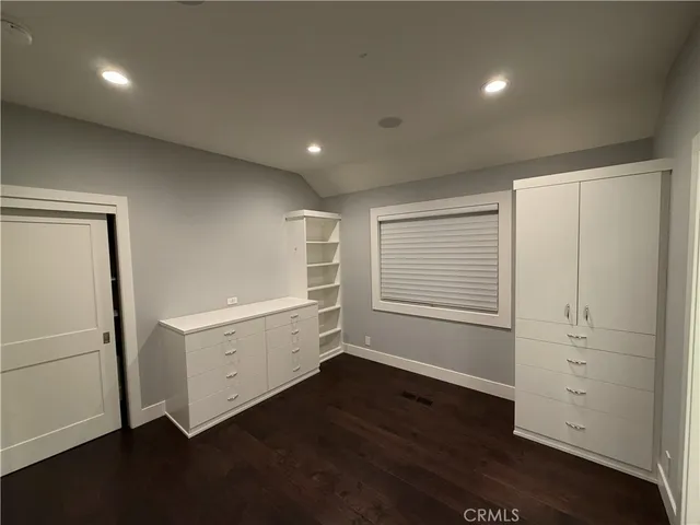 a bathroom with a shower toilet and sink