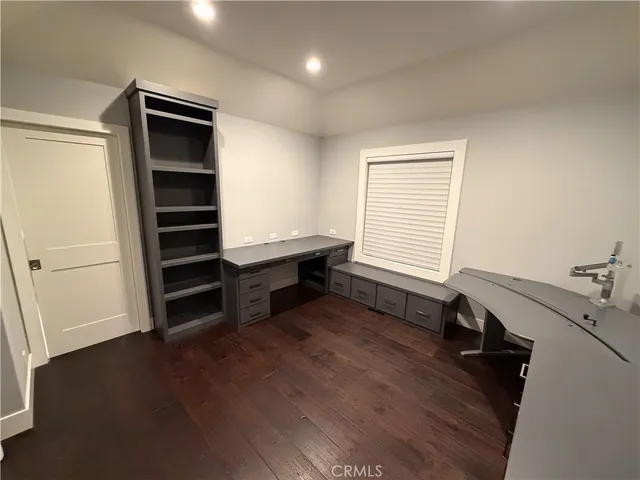 a view of a hallway with washer and dryer