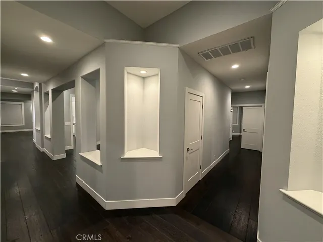 a view of a house with backyard space and balcony