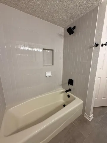 a bathroom with a bathtub