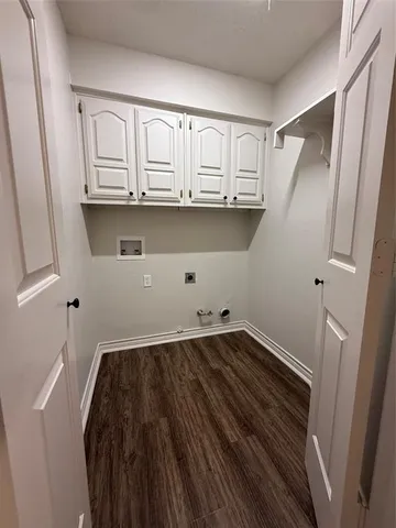 a view of a sink with wooden floor