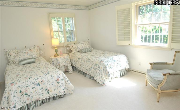 340 Tremont Road Akron, OH 44313 - Photo 19 of 25 Bedroom #3 has neutral décor, two windows with plantation shutters, ceiling fan & light fixture and large closet.