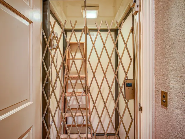 a bathroom with a shower curtain and a shower curtain