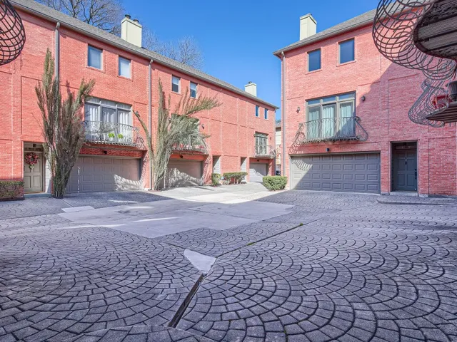 a view of a house with a street