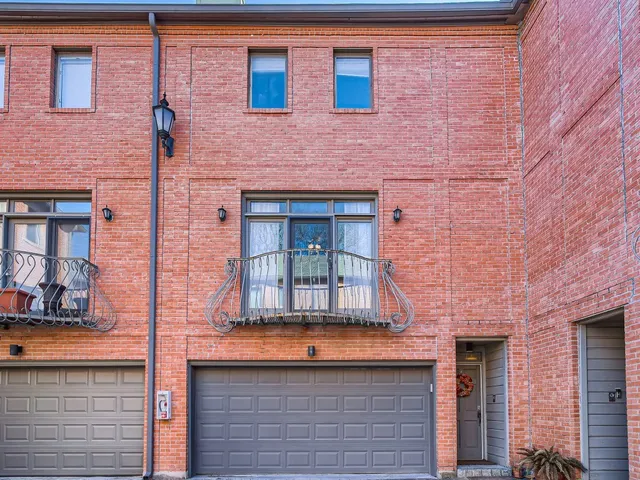 a front view of a building with brick walls