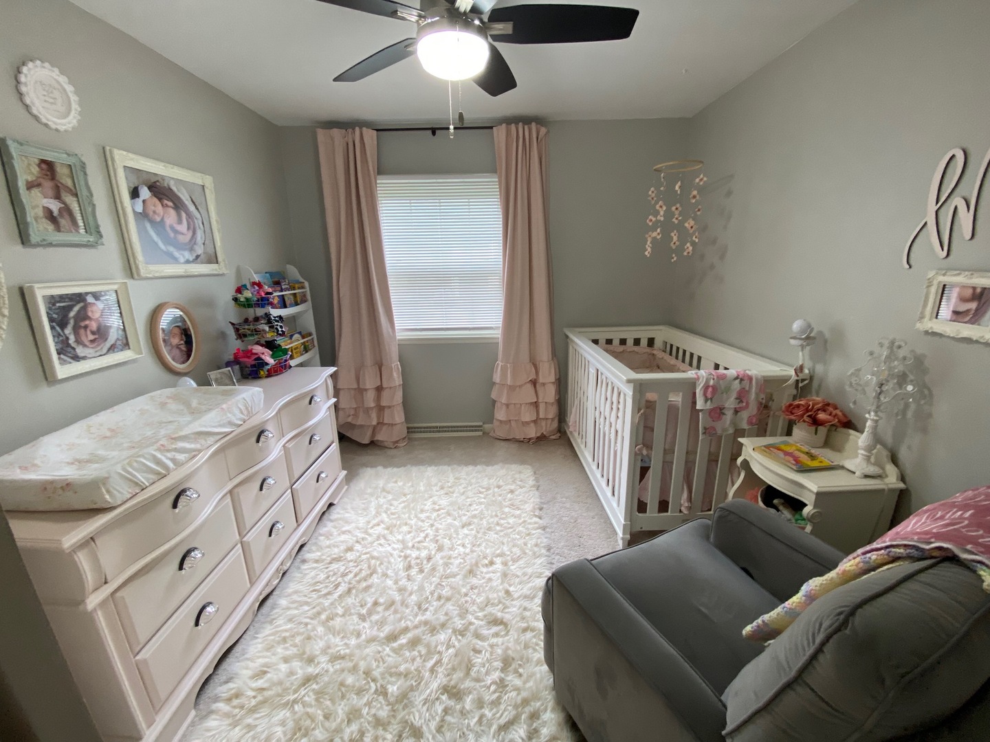 1902 Crescent Drive Champaign, IL 61821 - Photo 10 of 24 a bedroom with furniture and a chandelier