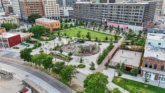 an aerial view of a city with lots of residential buildings