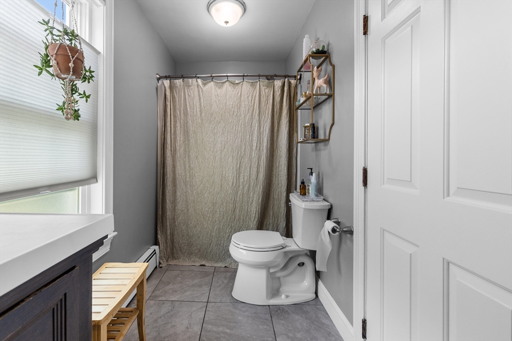 11 Saucier Street Acushnet, MA 02743 - Photo 13 of 35 a bathroom with a granite countertop sink toilet and shower