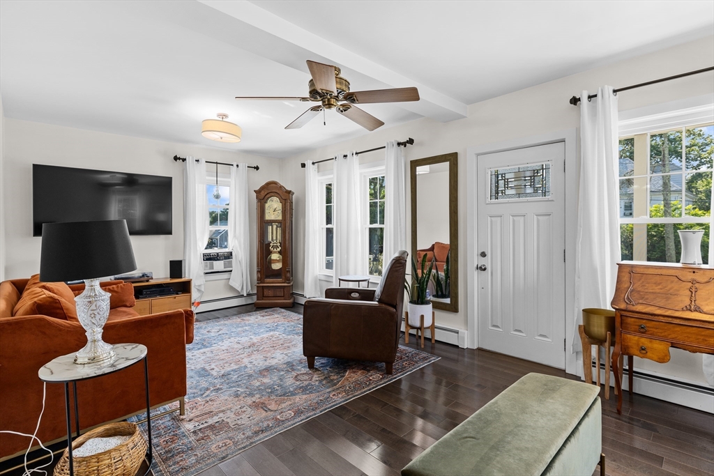 11 Saucier Street Acushnet, MA 02743 - Photo 2 of 35 a living room with furniture and a flat screen tv