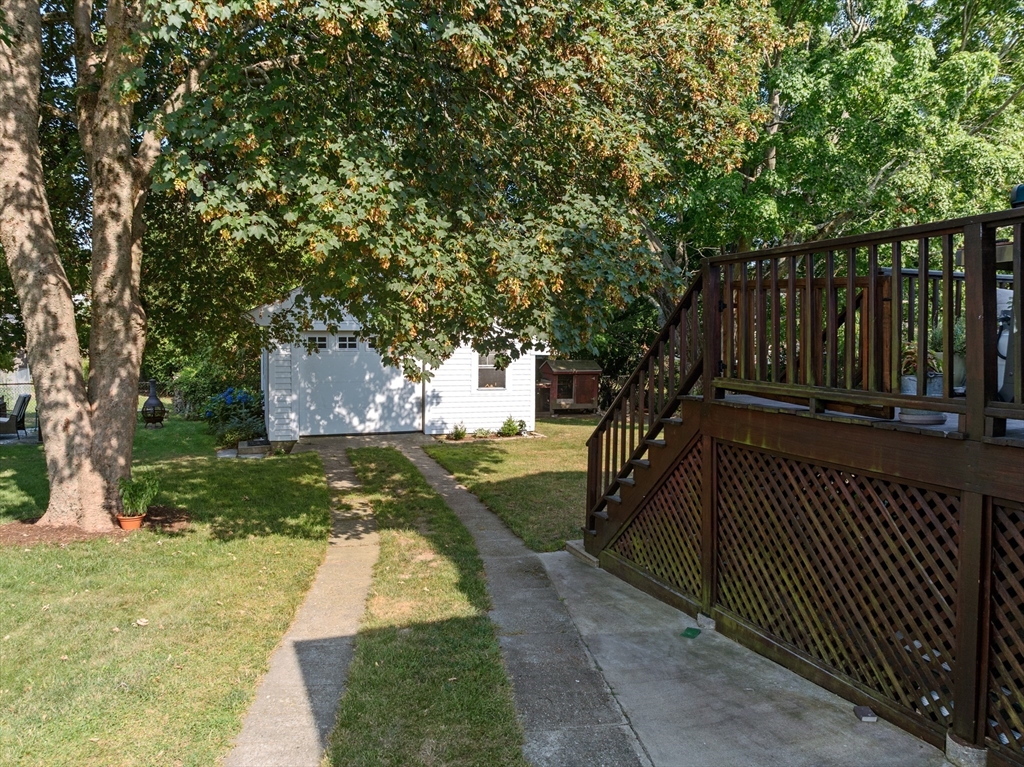 11 Saucier Street Acushnet, MA 02743 - Photo 26 of 35 a backyard of a house with lots of green space