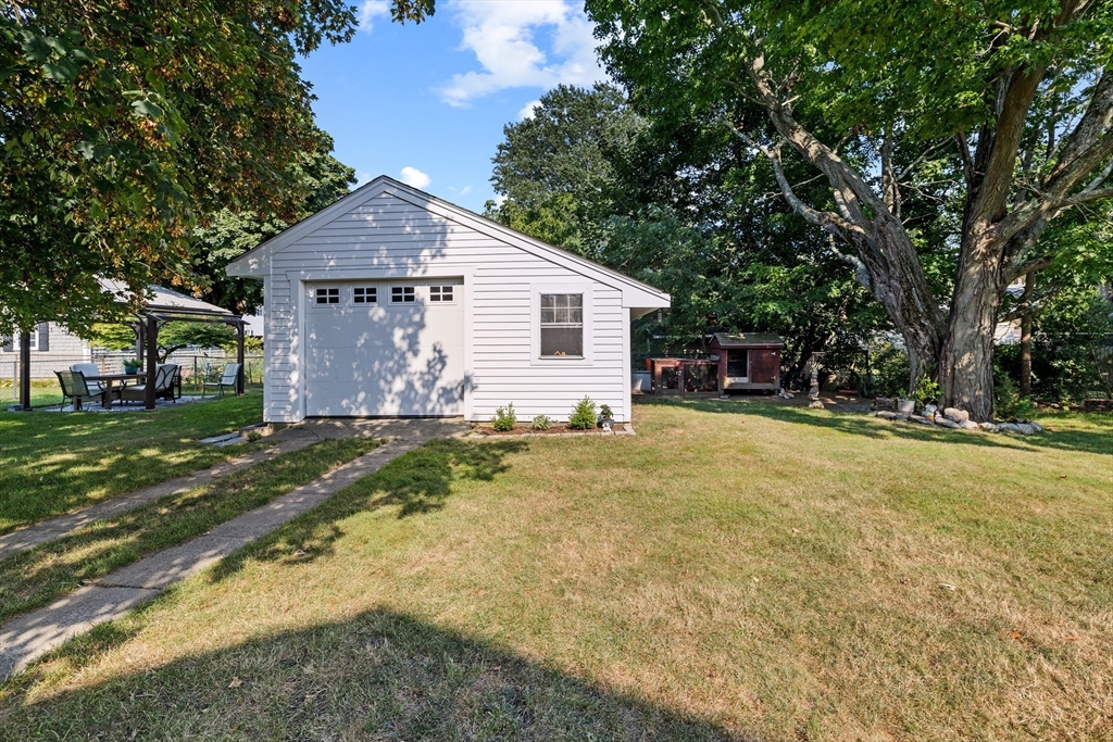 11 Saucier Street Acushnet, MA 02743 - Photo 27 of 35 a view of a house with a yard