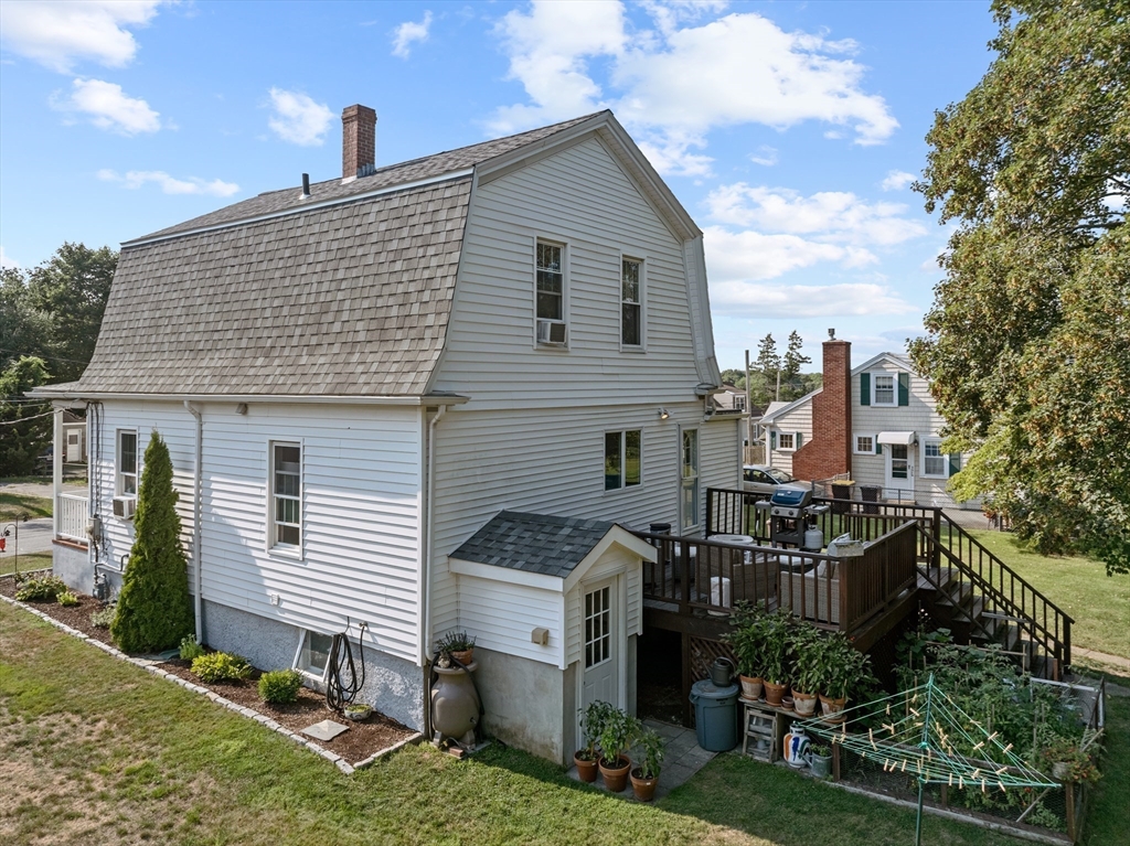 11 Saucier Street Acushnet, MA 02743 - Photo 31 of 35 a front view of a house with a garden