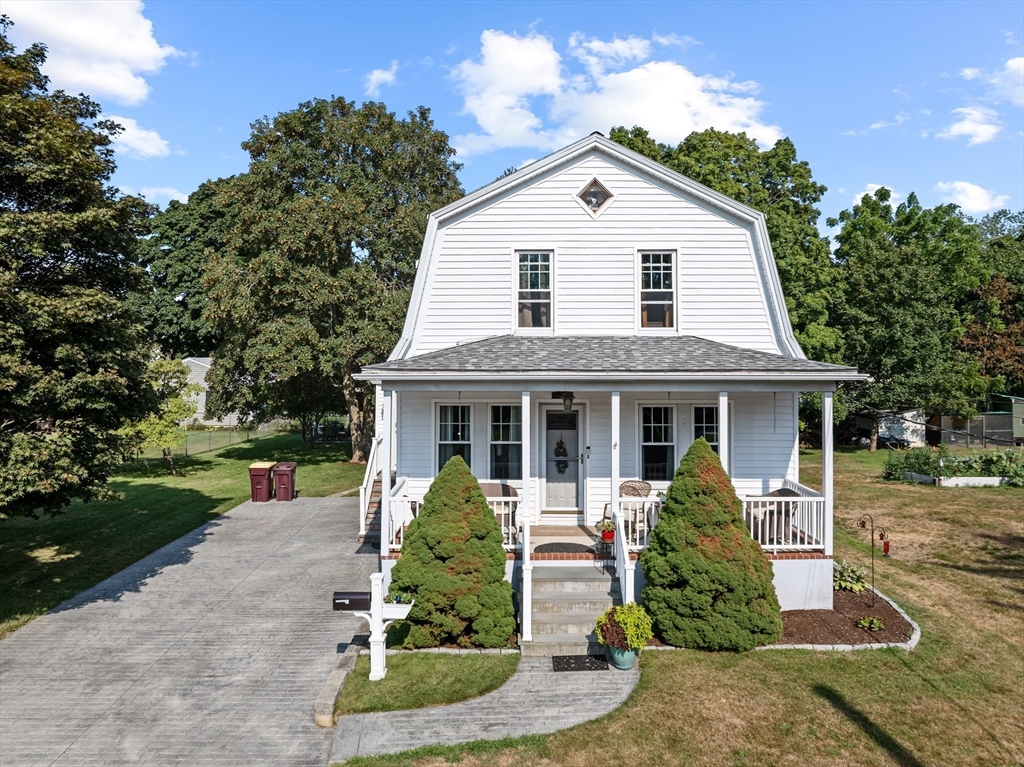 11 Saucier Street Acushnet, MA 02743 - Photo 33 of 35 a front view of a house with a yard