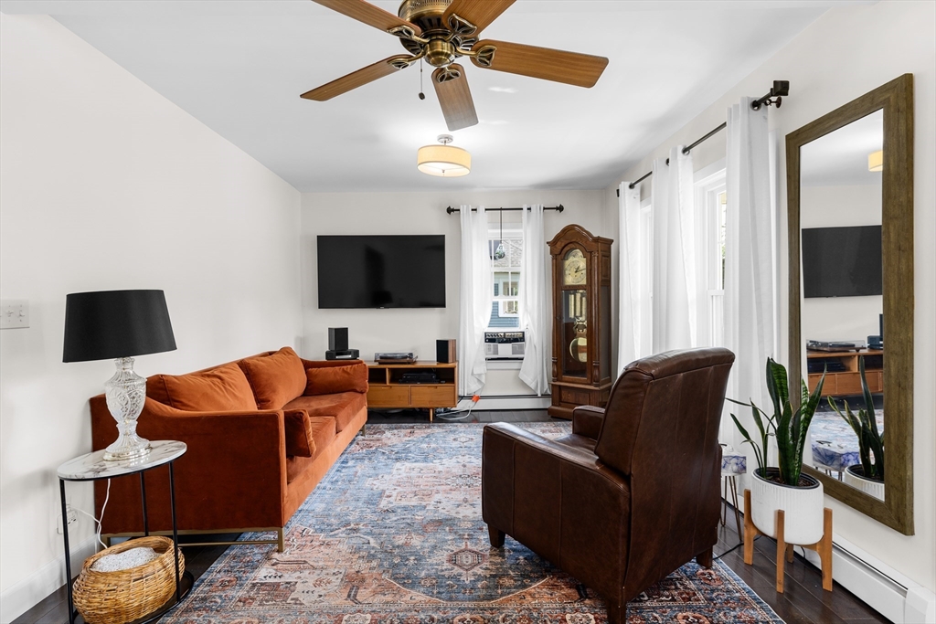 11 Saucier Street Acushnet, MA 02743 - Photo 7 of 35 a living room with furniture and a flat screen tv
