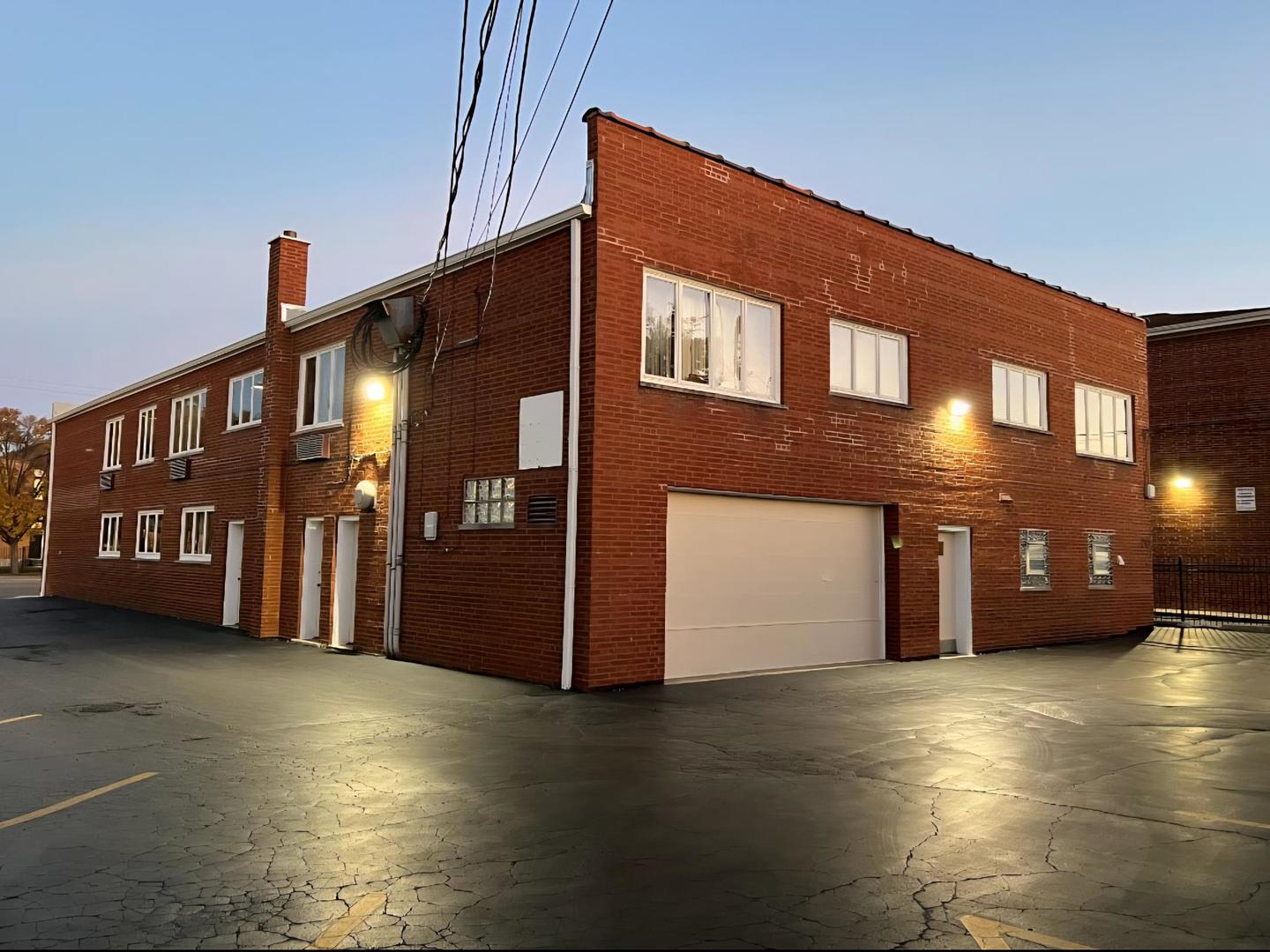 7922 South Pulaski Road Chicago, IL 60652 - Photo 94 of 96 a front view of a building with parking space