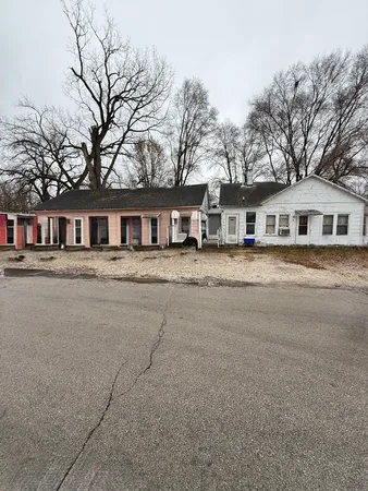 front view of a house with a small yard