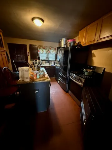 a room with furniture and flat screen tv