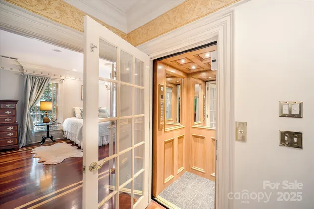 a living room with fireplace furniture and a flat screen tv