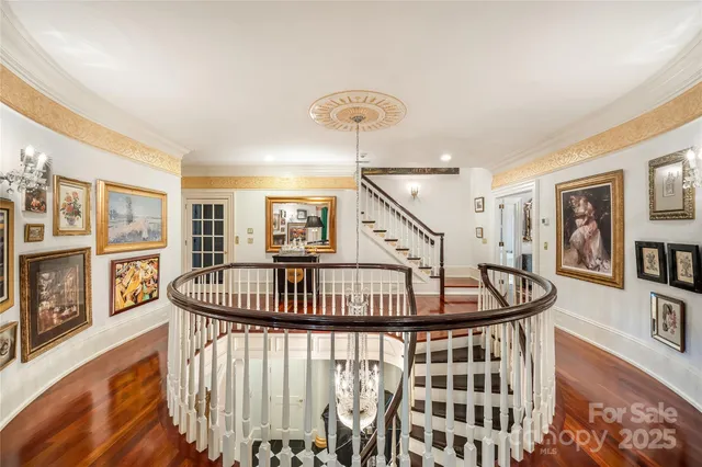 a bedroom with a bed a dresser and book shelf